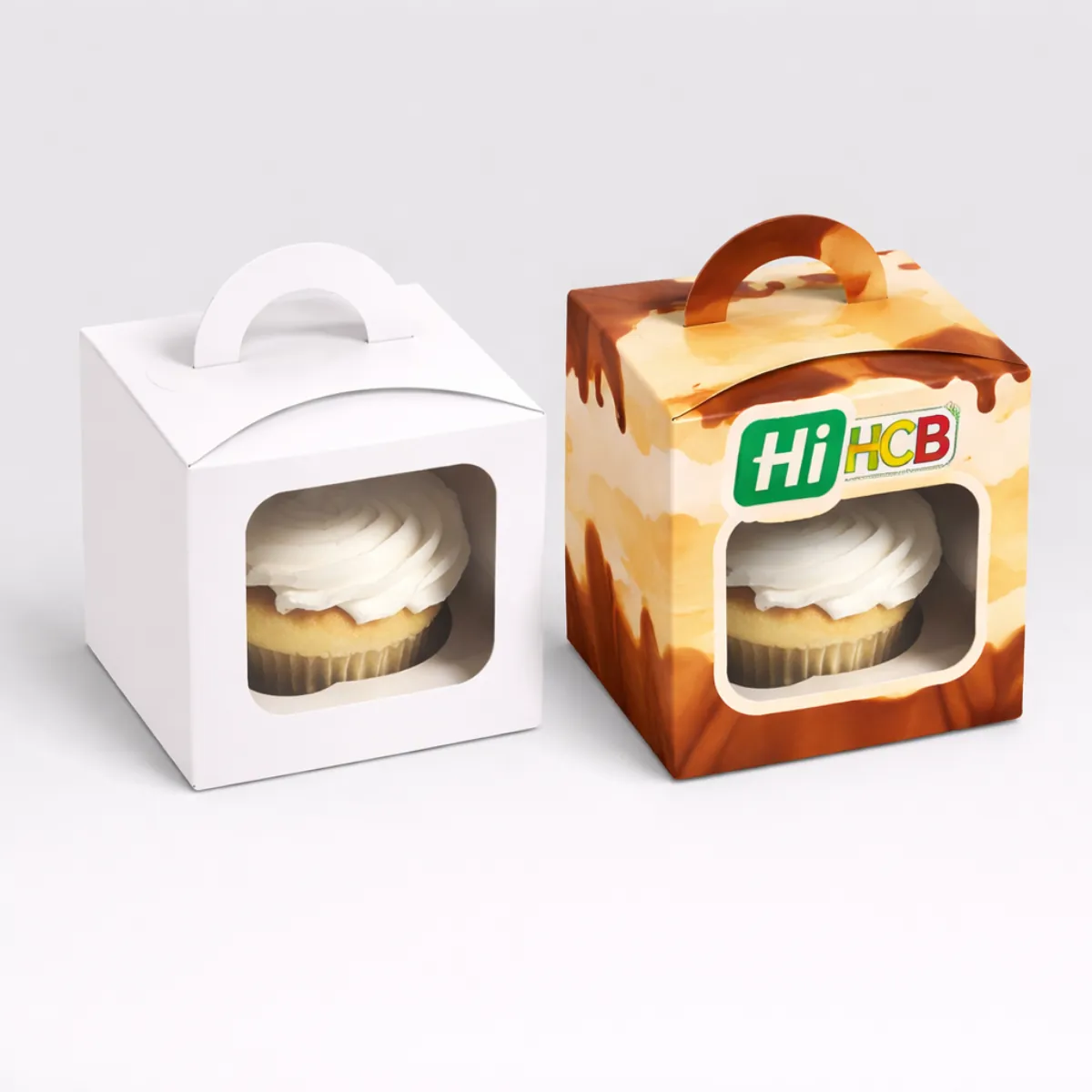 Customised fudge boxes with clear plastic windows to provide a tempting view of the sweets inside- class=